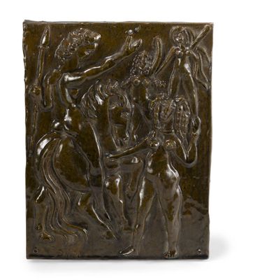 une plaque en bronze représentant un groupe de personnes à cheval