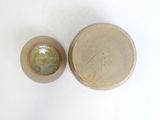 a small bowl and a small bowl sitting on a table