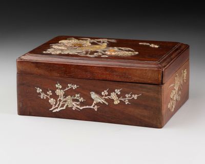 an image of a wooden box with birds and flowers on it