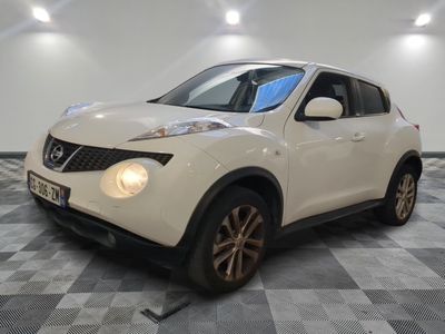 a picture of a white nissan juke suv