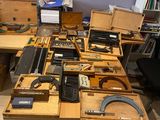 a lot of tools that are sitting on a table
