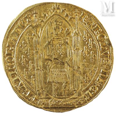 a gold coin with an image of a man on it