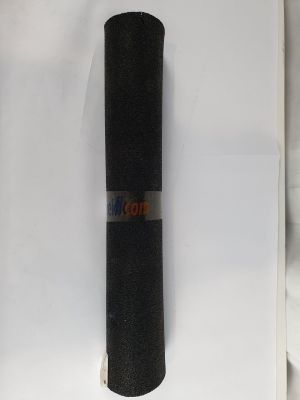 a roll of black yoga mat sitting on top of a white box