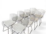 many chairs that are lined up in a row