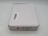 a white box with a sticker on it sitting on a table