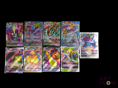 a lot of different types of pokemon cards on the table