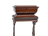 an old wooden table with a drawer on top of it