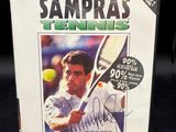 une image représentant une boîte sur laquelle figure l'image d'un homme tenant une raquette de tennis
