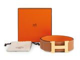 the hermes belt in tan and brown leather with gold hardware