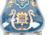 a blue vase with a gold and blue design on it