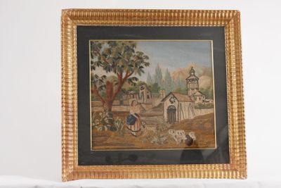tableau représentant une scène de village, dans un cadre doré, sur un fond blanc