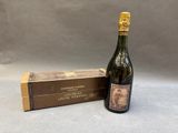 an image of a bottle of wine next to a box of wine