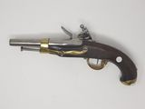 an old gun that is sitting on top of a table