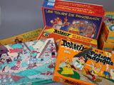 a lot of vintage board games on display on the table