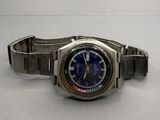 an image of a wrist watch with a blue dial