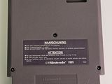 a close up of a nintendo game on a table