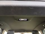 a picture of a car dashboard with a clock on it