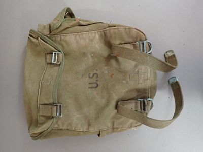 a tan bag with a number on it sitting on a table