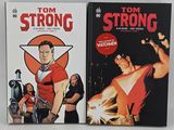 two comics are sitting on a table next to each other