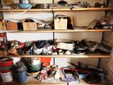 a shelf with many items on it in a room