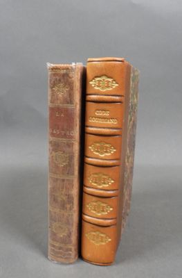 two books that are sitting side by side on a table