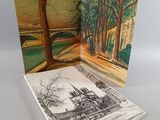 un livre ouvert sur lequel est dessiné une maison et des arbres