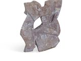 a stone sculpture of a man and a woman on a white background