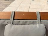 a bag hanging on the back of a chair