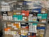 a large cart with many boxes on it in a warehouse