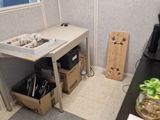 a small kitchen with a sink and a table in it