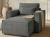 an image of a chair and ottoman in a living room
