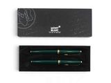 a green fountain pen in a black box on a white surface