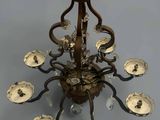 an image of a chandelier with a bunch of lights hanging from the ceiling