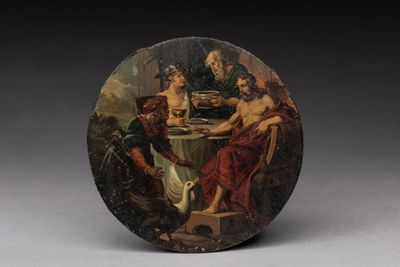 une image représentant une assiette sur laquelle est peinte une scène représentant un groupe de personnes