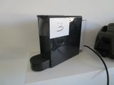 une image représentant une machine à café sur laquelle figure un chiffre