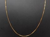a gold chain necklace on a mannequin mannequin mannequin mannequin mannequin mannequin mannequin mannequin manne