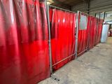 many red curtains in a room with a lot of windows
