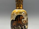 an image of a vase with a horse painted on it