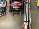 a lot of tools that are laying out on the floor