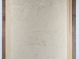 an old photo of a painting on a stand with a piece of paper in it