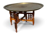 an image of a table with a metal tray on it