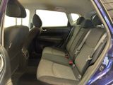 a purple car with two seats in the back of it