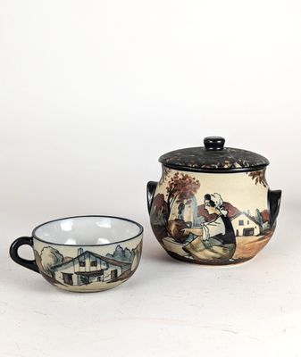 three pieces of pottery are sitting on a white surface