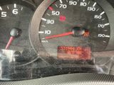 a close up of a speedometer in a car