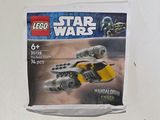 un sachet de figurines Lego Star Wars posé sur une table