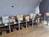many boxes sitting on a table in the middle of a room