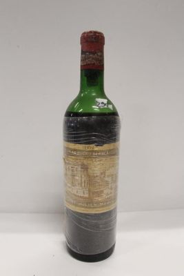 a bottle of wine that is sitting on a table