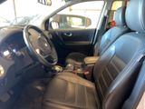 the interior of a car with black leather seats and a steering wheel