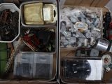 a box full of assorted electronics and other items