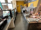 an image of a restaurant with a counter and a counter top